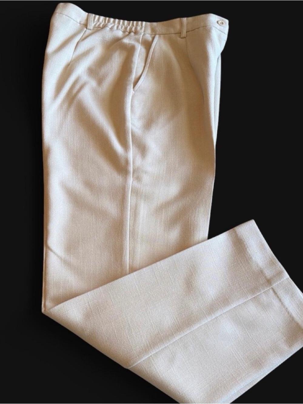 Women’s 10P dress pants by The Tog Shop, cream color, lined, pockets , cuffed.